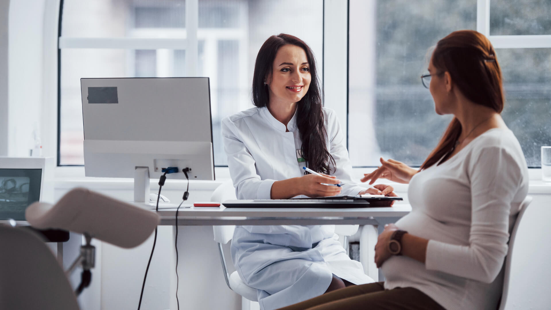 Doctor with Pregnant Patient Image